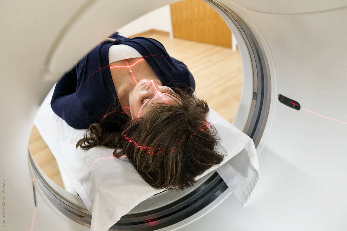 Clinic: Woman Patient With Eyes Closed Before CT Scan