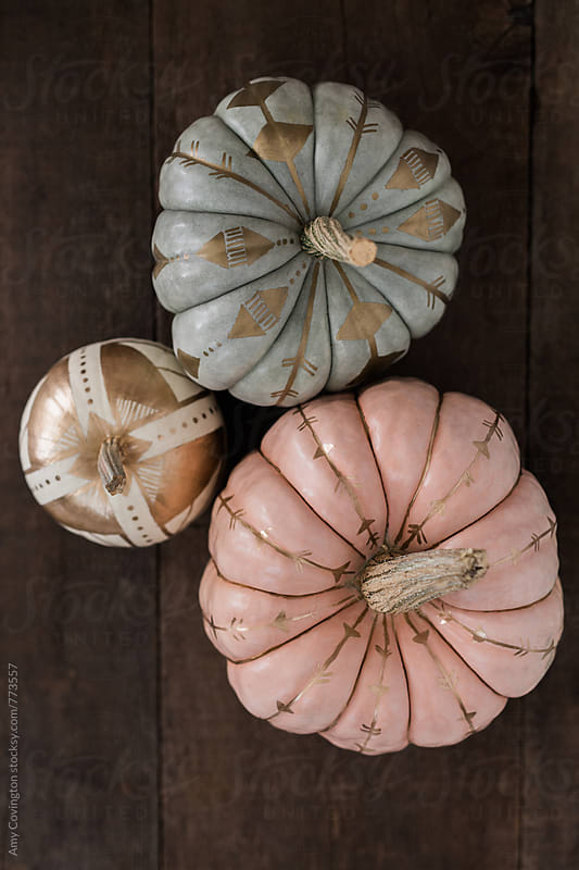 Pastel pumpkins painted with gold paint