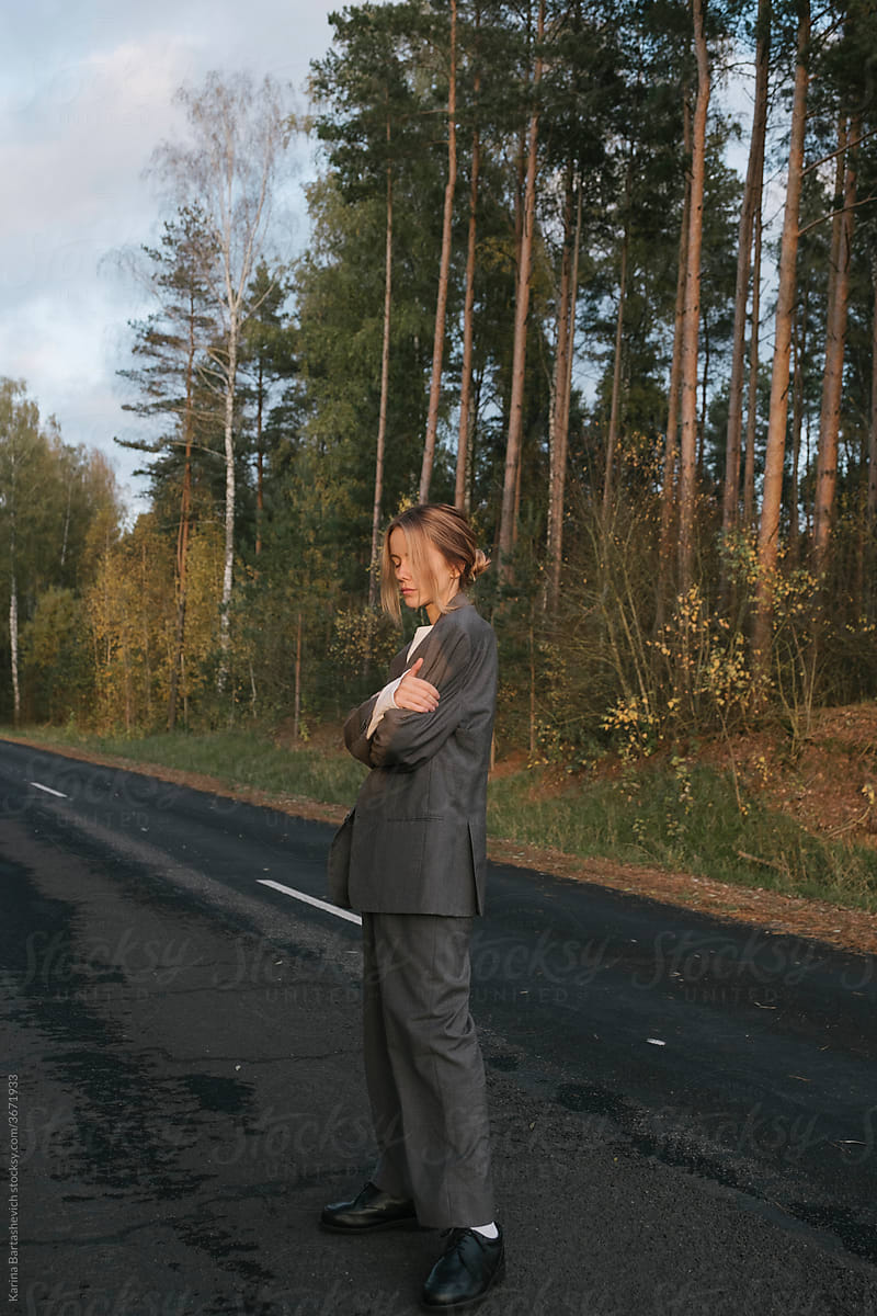 girl standing on the road