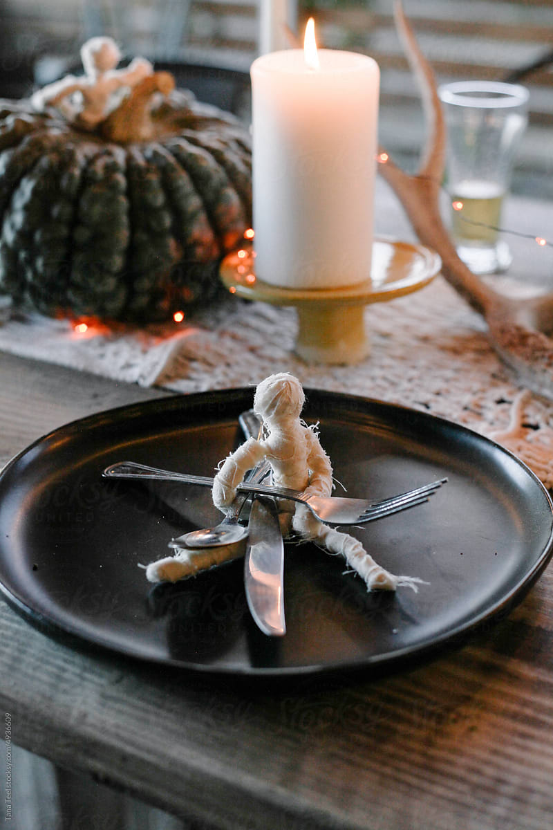 handmade mummy place setting on black plate for Halloween
