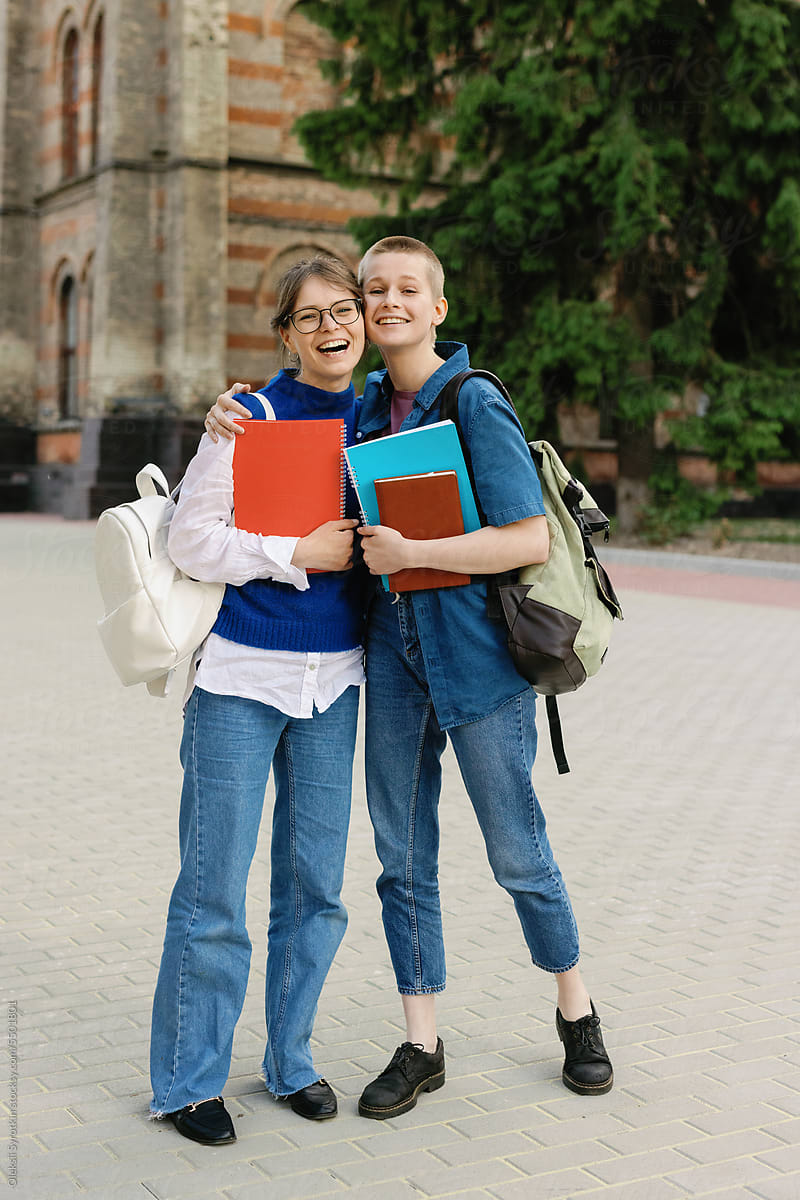 Classmate education seeker friendship embrace campus back to school