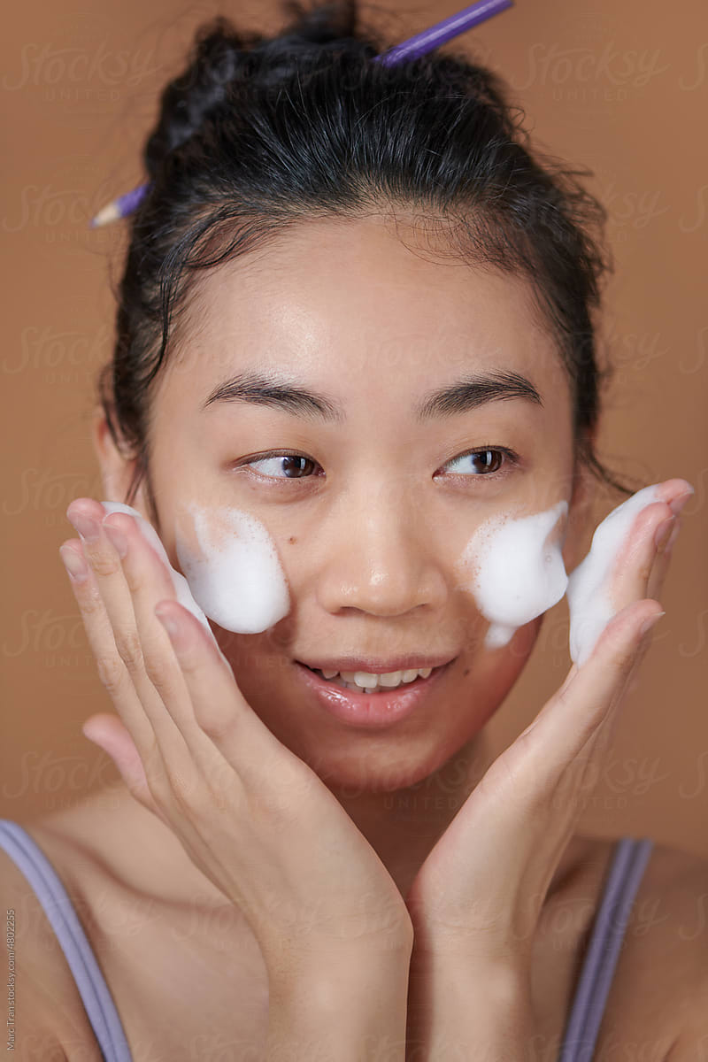 Funny girl during cleansing home procedure use professional