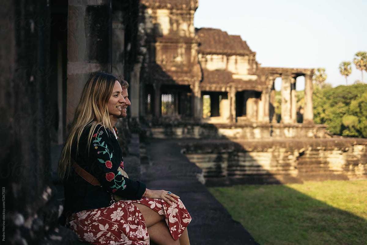 Tourists visiting Angkor Wat temple ruins