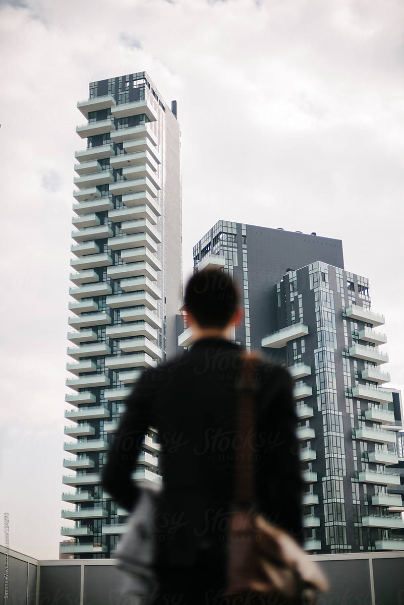 Man standing in front at building