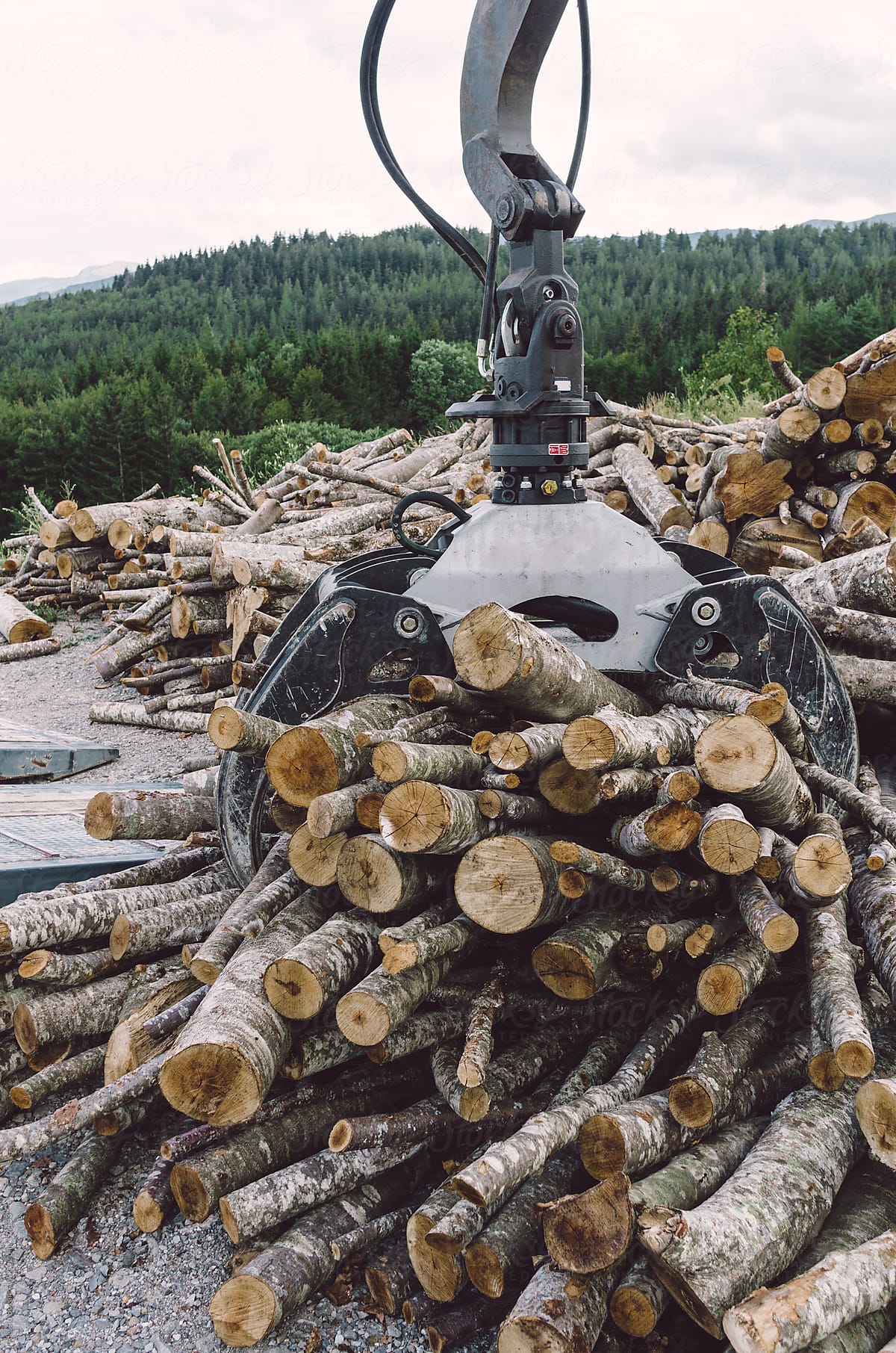 Machine stacking lumber