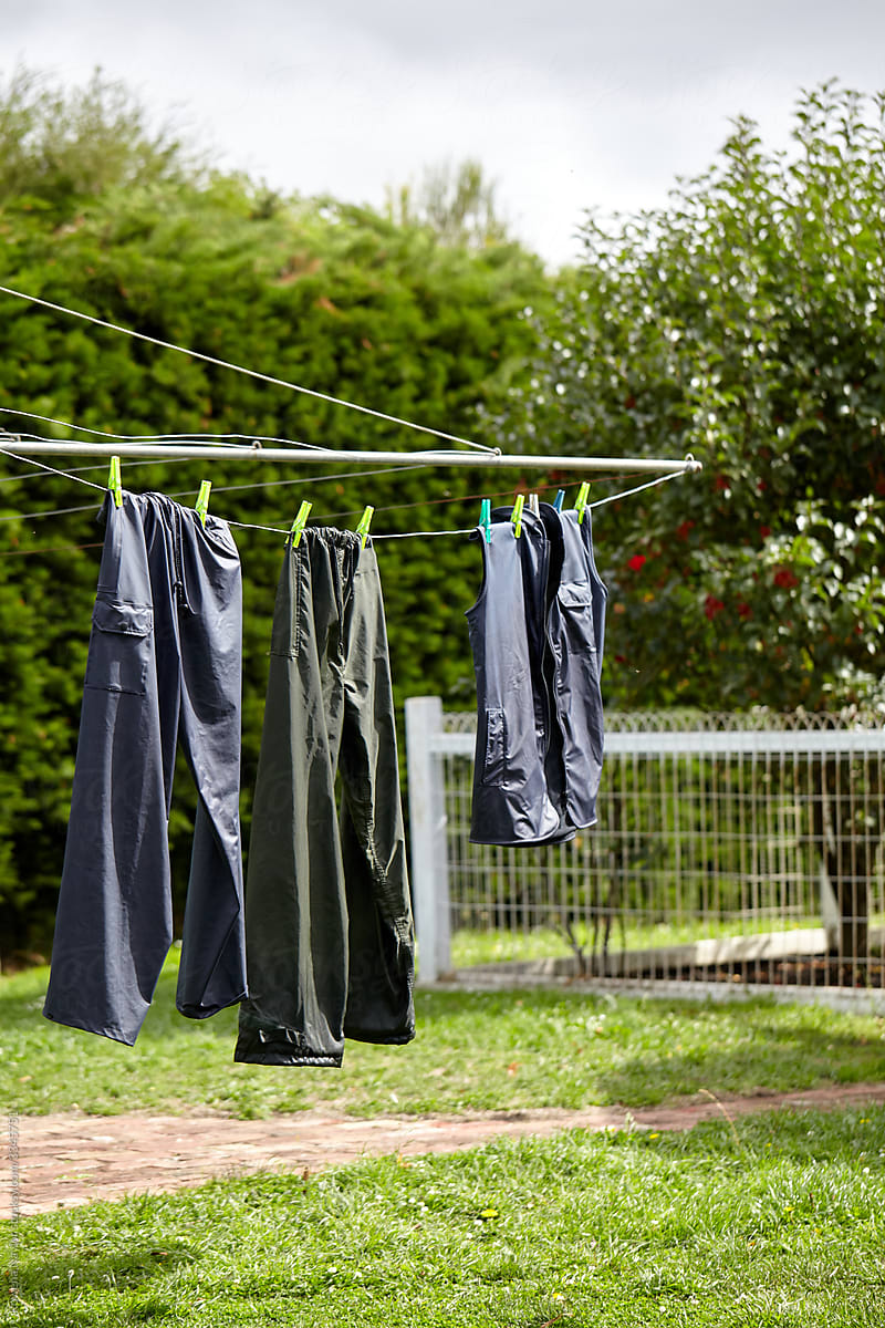 Dairy farmer work clothes hanging to dry on australian hills hoist