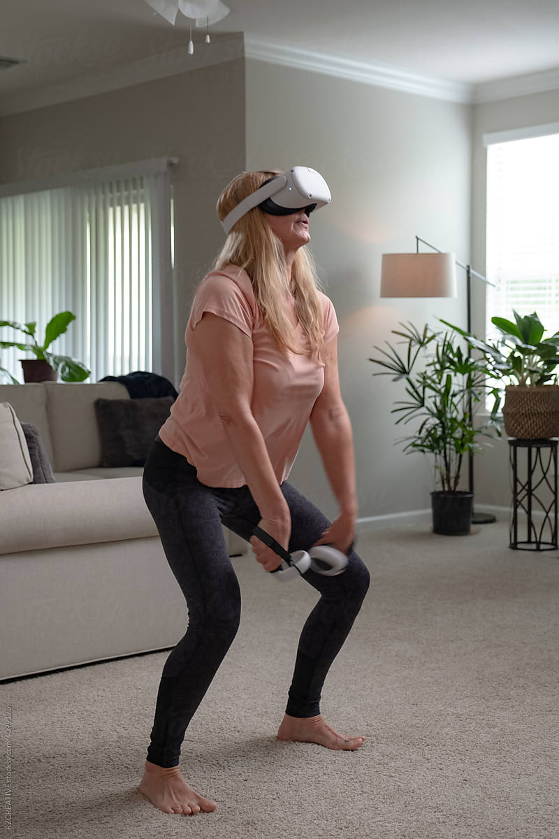 Woman in virtual reality at home.