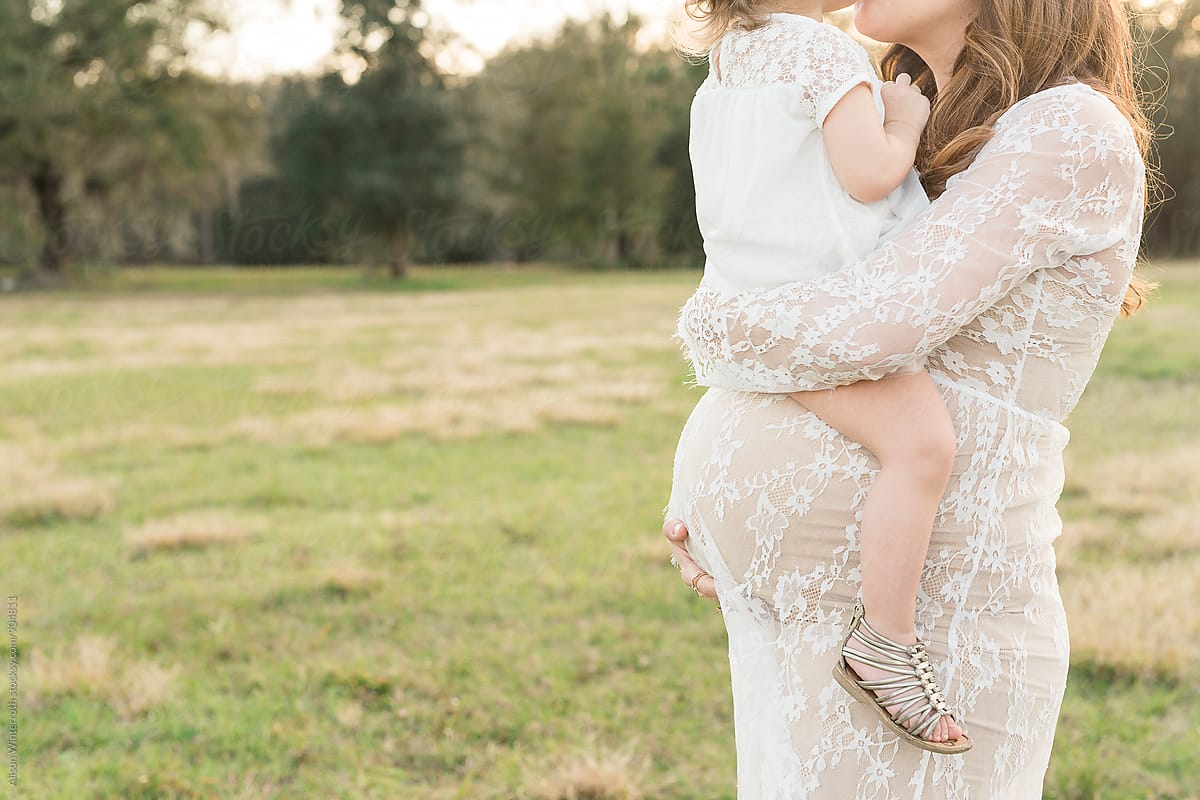 Young Girl Kisses Her Mother By Stocksy Contributor Alison Winterroth Stocksy 