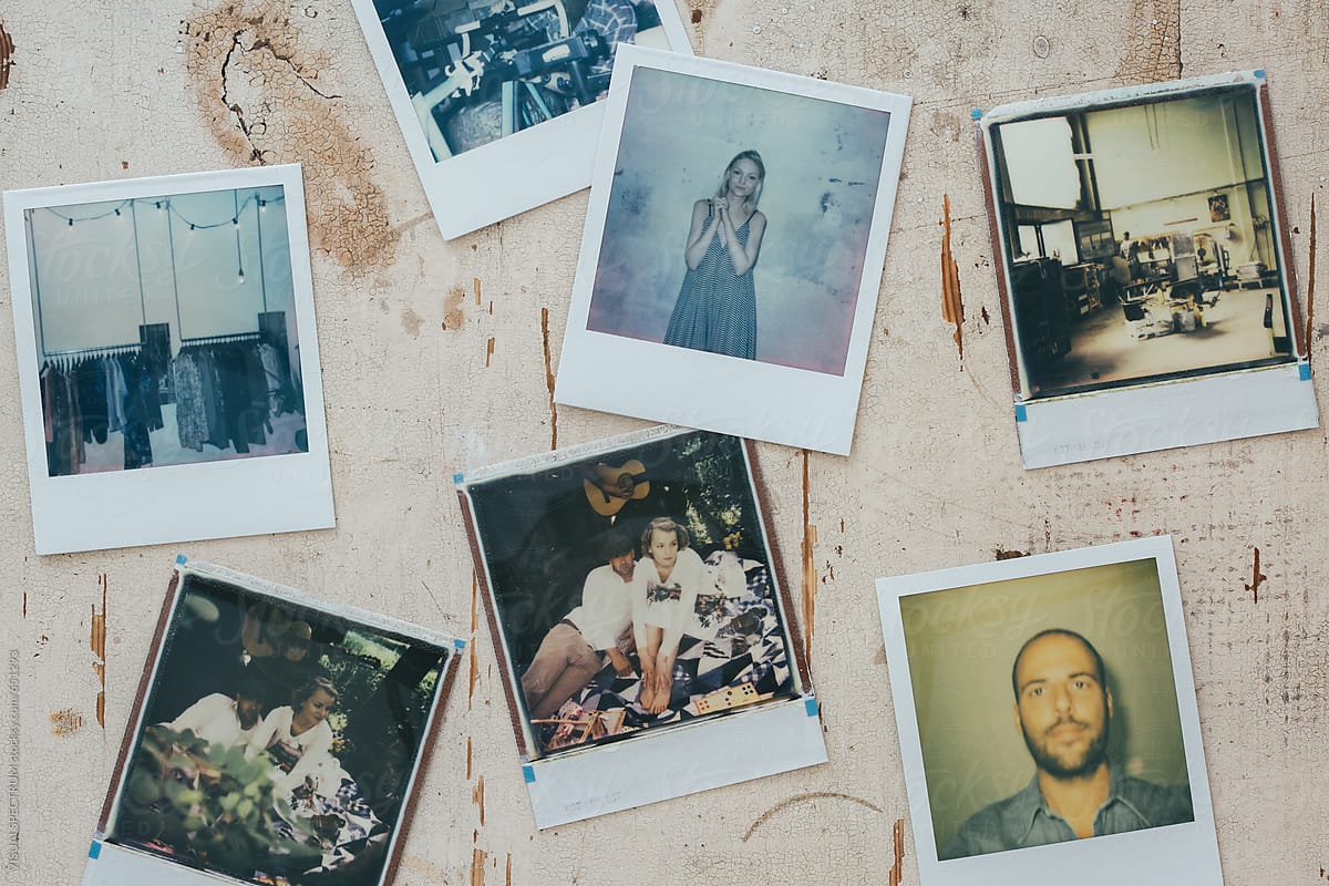 Seven Polaroid Color Images on White Vintage Tabletop