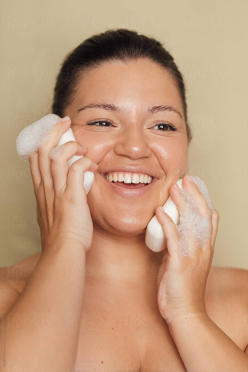 Woman Washing Face with Soap