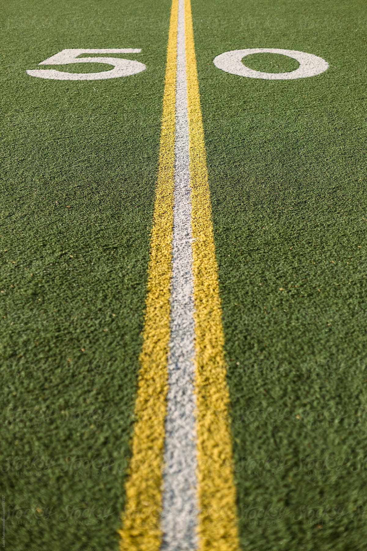 Fifty Yard Line Marked On Turf Football Field