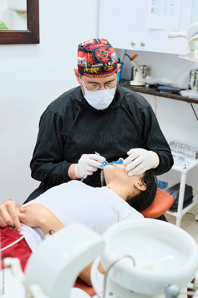 Young woman and dentist during a dental procedure