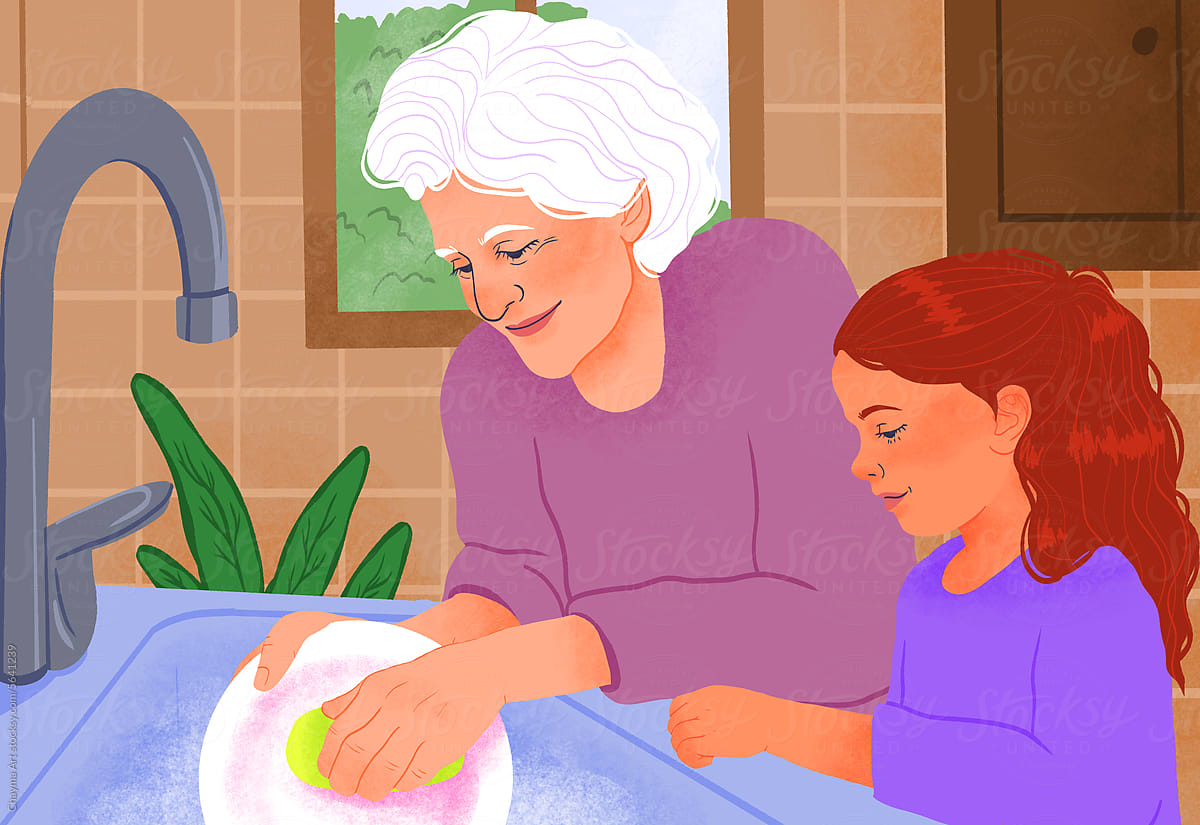 Grandmother and granddaughter doing dishes at kitchen sink