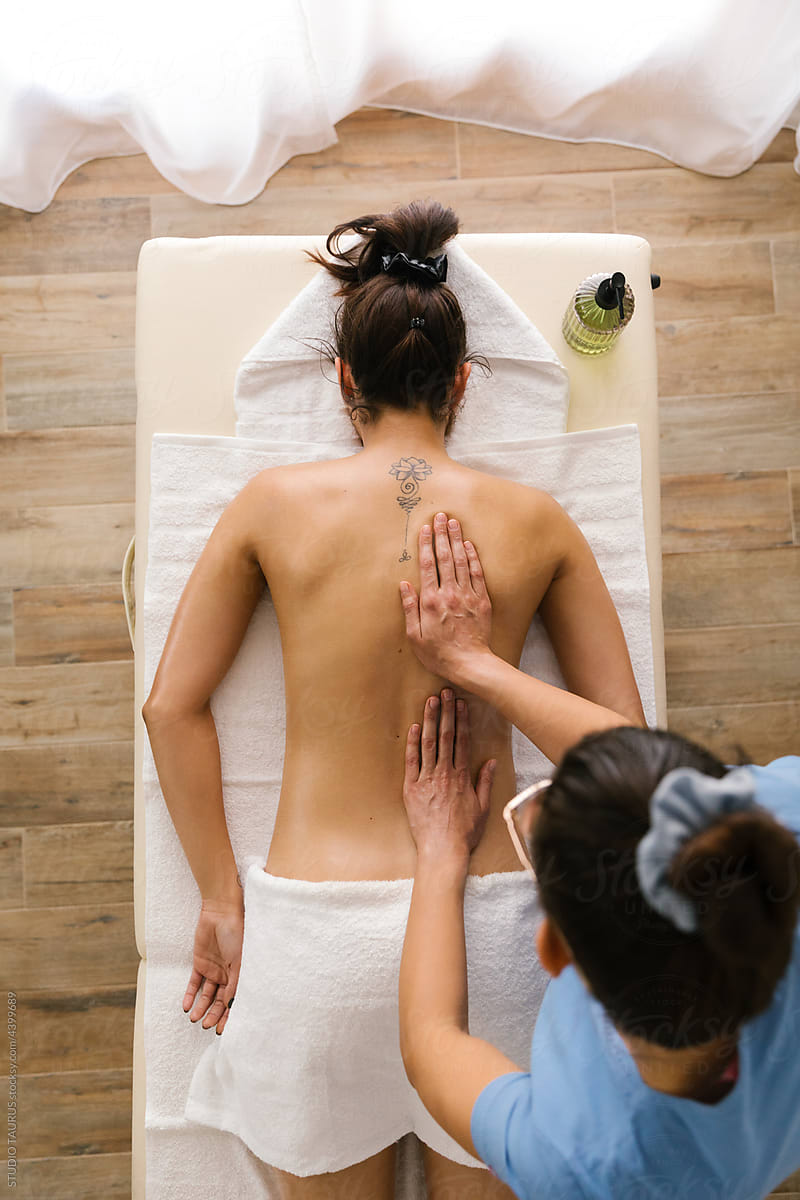 Woman on massage table having a professional massage