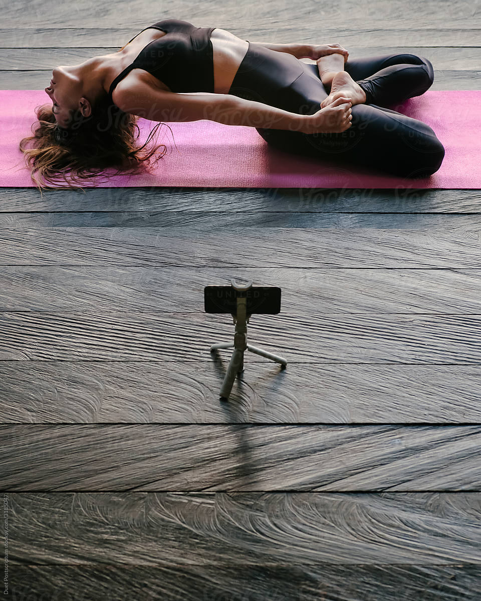 Beautiful Girl Doing Yoga On Yoga Mat By Stocksy Contributor Duet