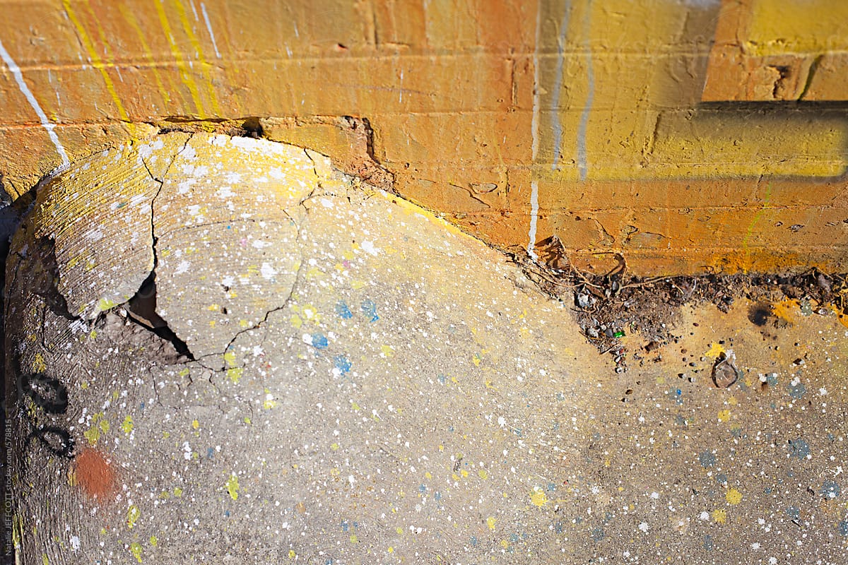 urban environment - paint drips from graffiti on the ground
