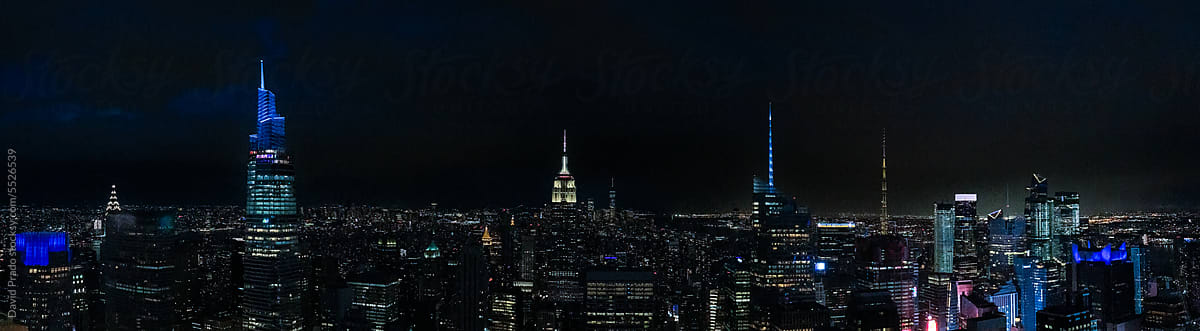 Panoramic Illuminated skyscrapers in night city