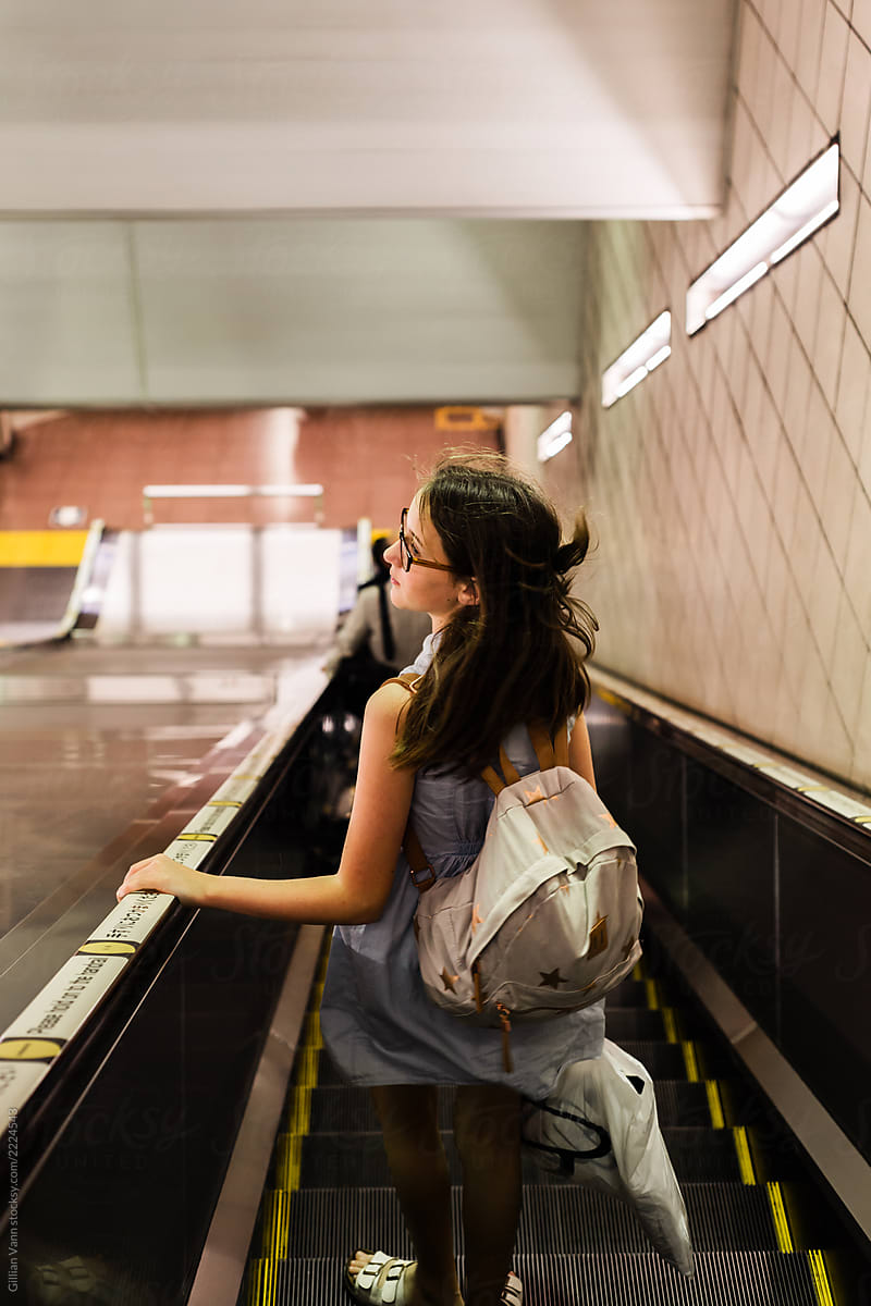 tourist on subway escalator