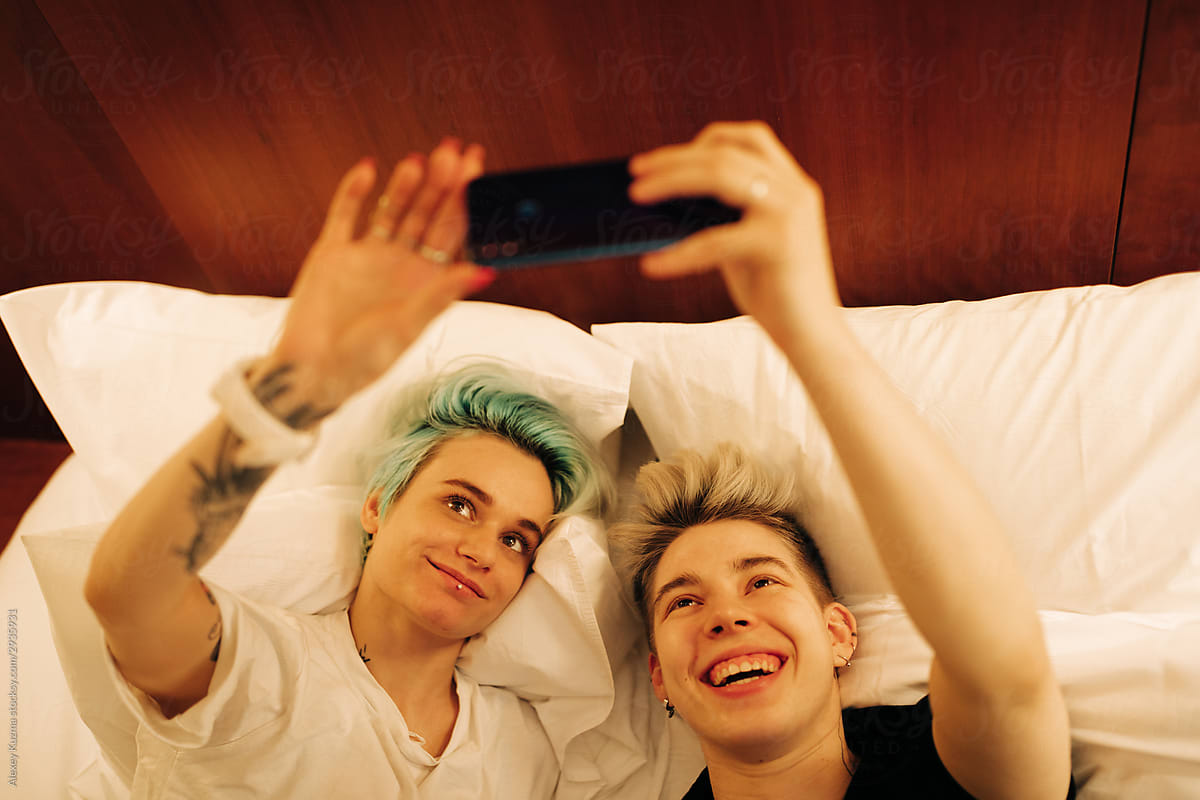 Lesbian Couple Making Selfie By Stocksy Contributor Alexey Kuzma