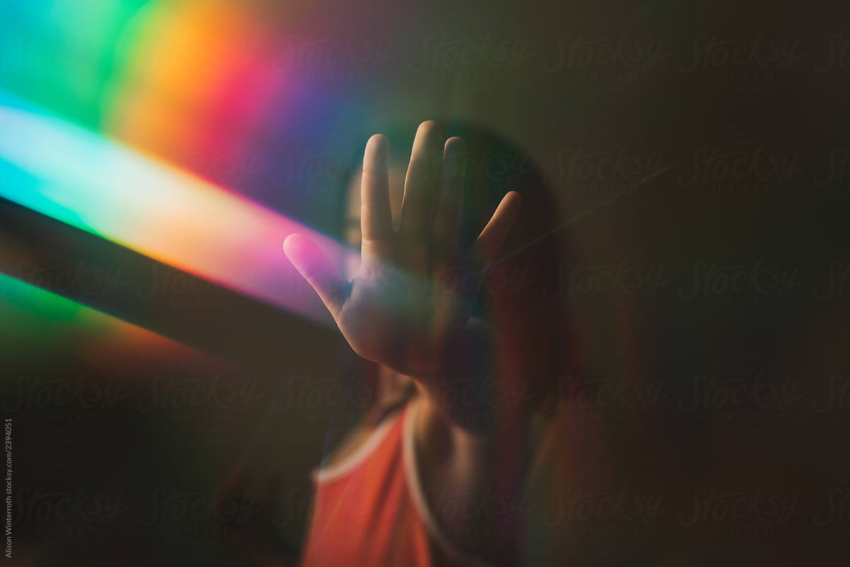 A Girl Says Stop With A Rainbow On Her Hand