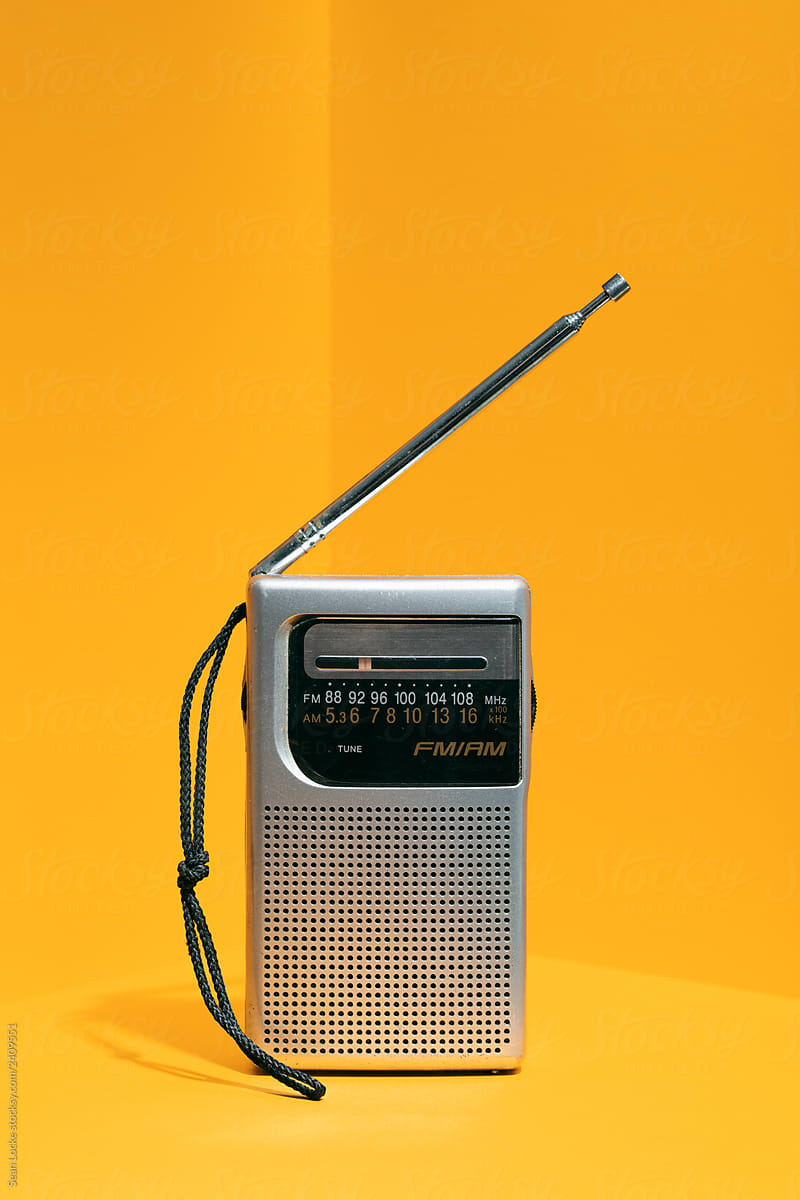 Retro Portable Radio On Yellow Background