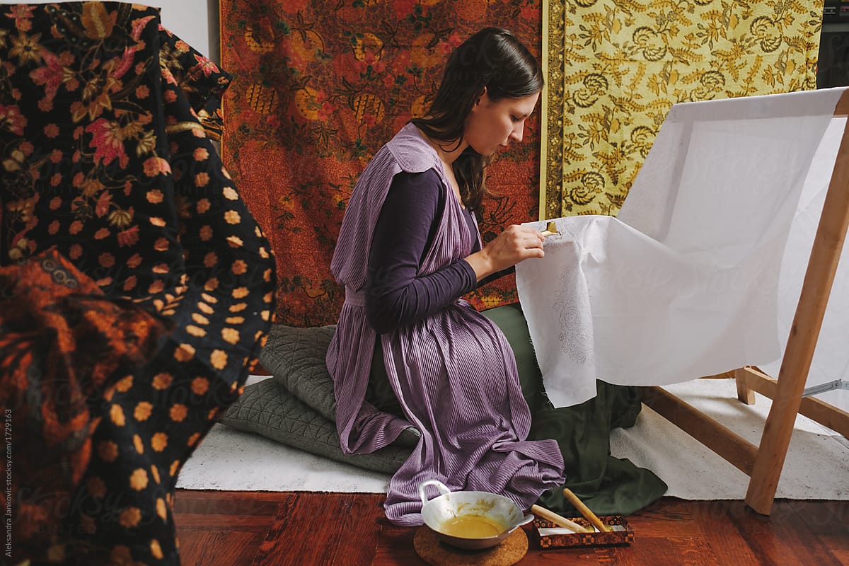 Woman Doing Batik Technique On The Piece Of Cloth
