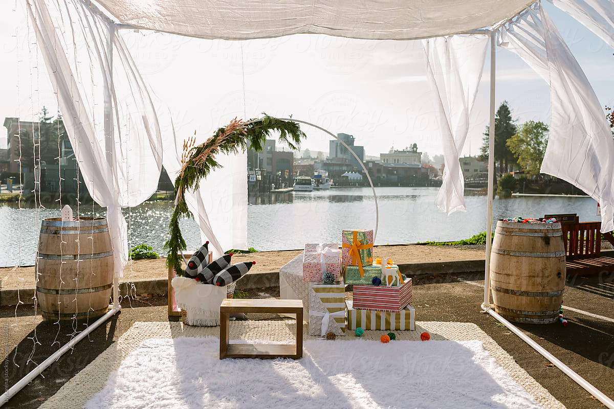 Outdoor pergola with holidays setup by the river