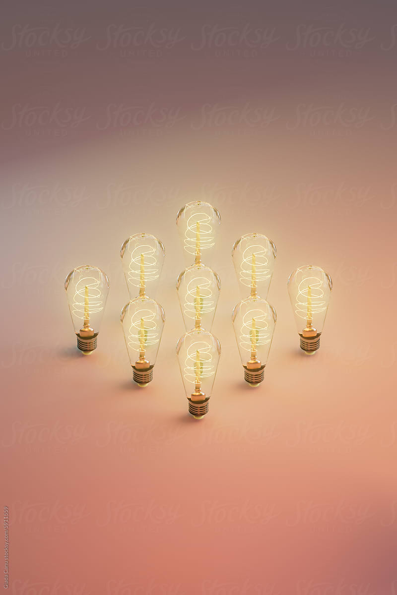 Array of Glowing Edison Bulbs on Gradient Background