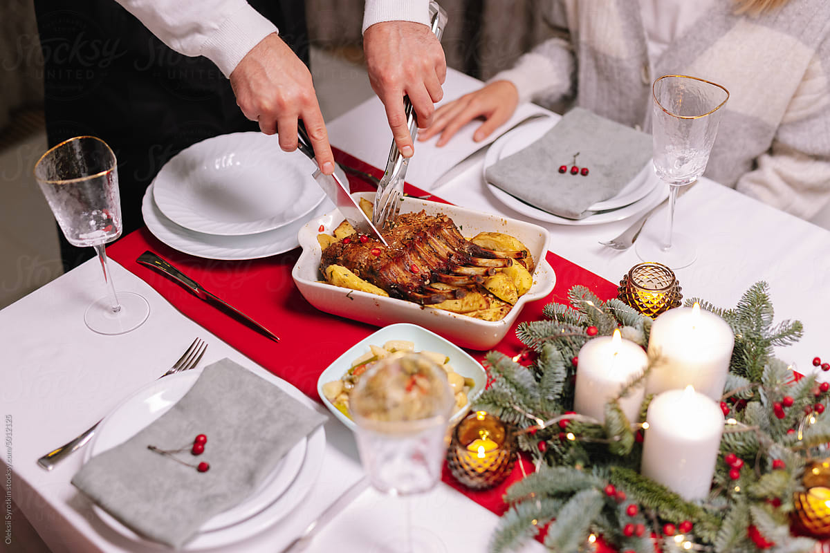 Christmas ham cut cutlery table setting glazed food dinner