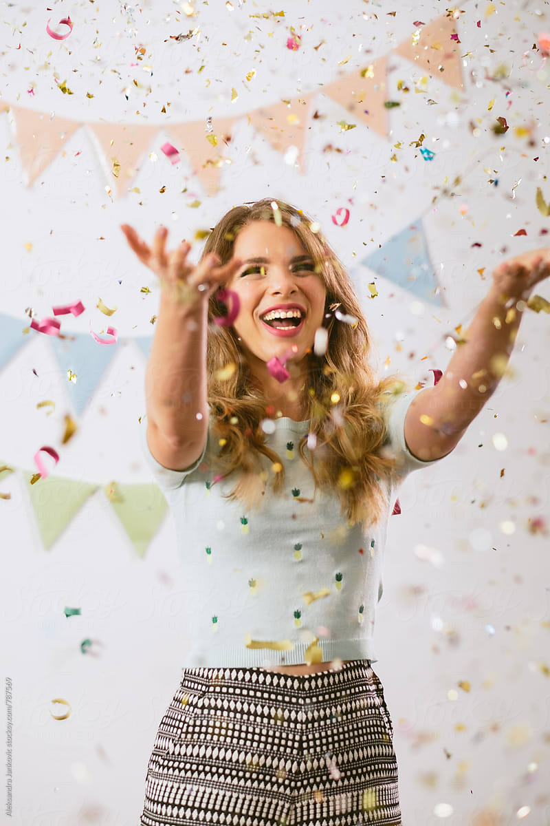 Joyful Caucasian Woman At The Party With Confetti