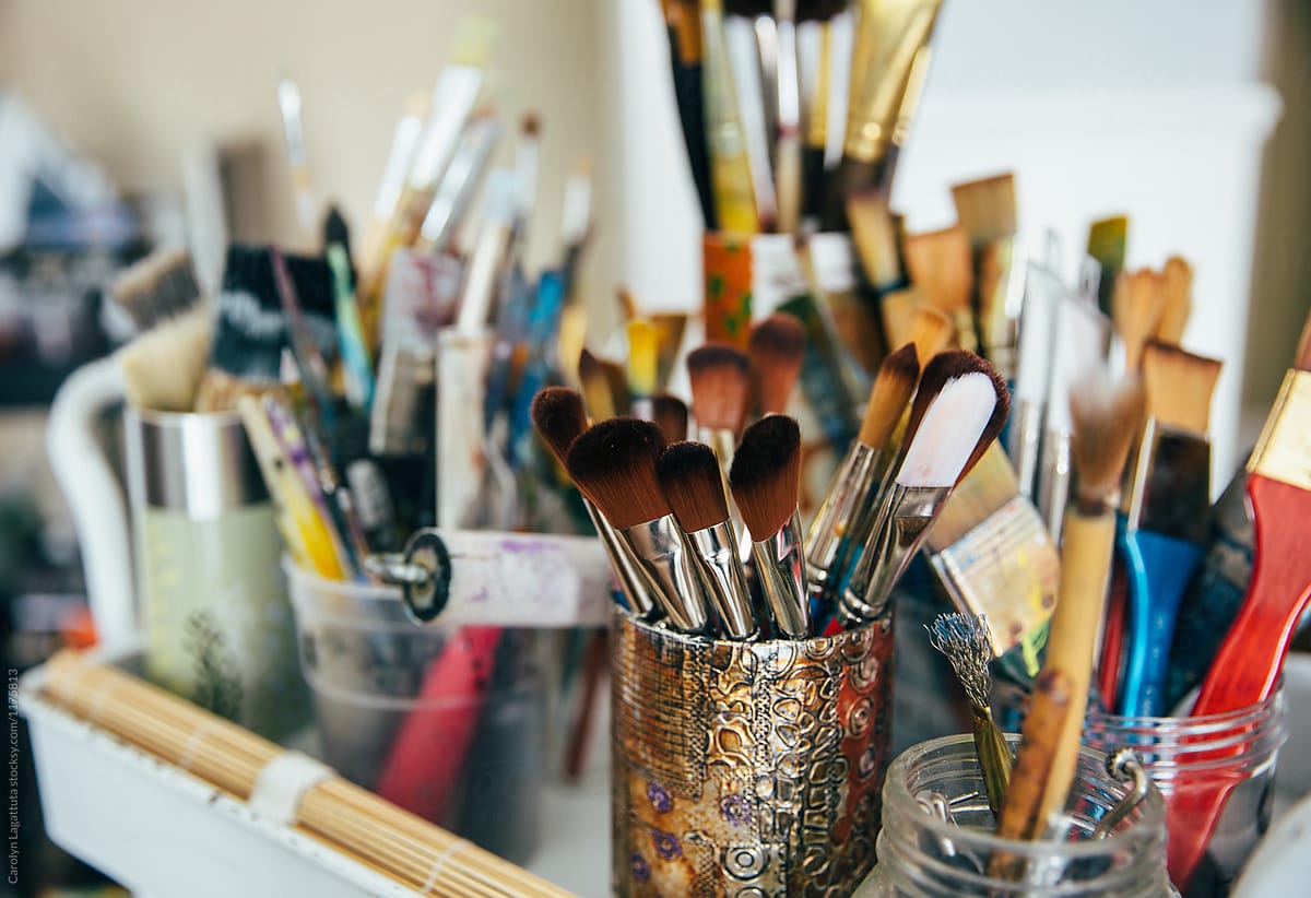 Large Selection Of Paint Brushes And A Mini Paint Palette by Stocksy  Contributor Carolyn Lagattuta - Stocksy