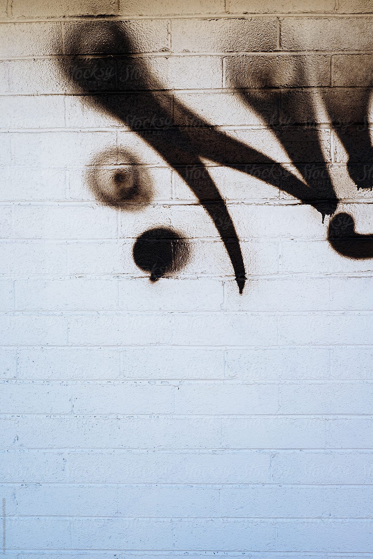 graffiti detail, black on white wall