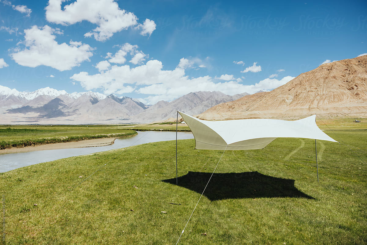 Modern Canopy Shelter in a High-altitude Pastoral Scene