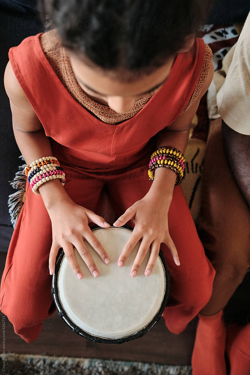 Girl Playing Djembe Drum