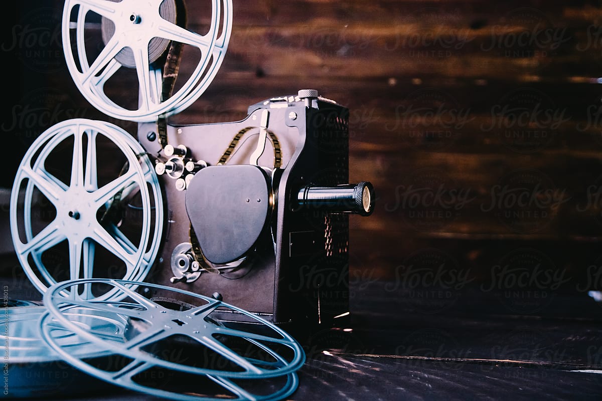 Retro 16mm film projector and film rolls