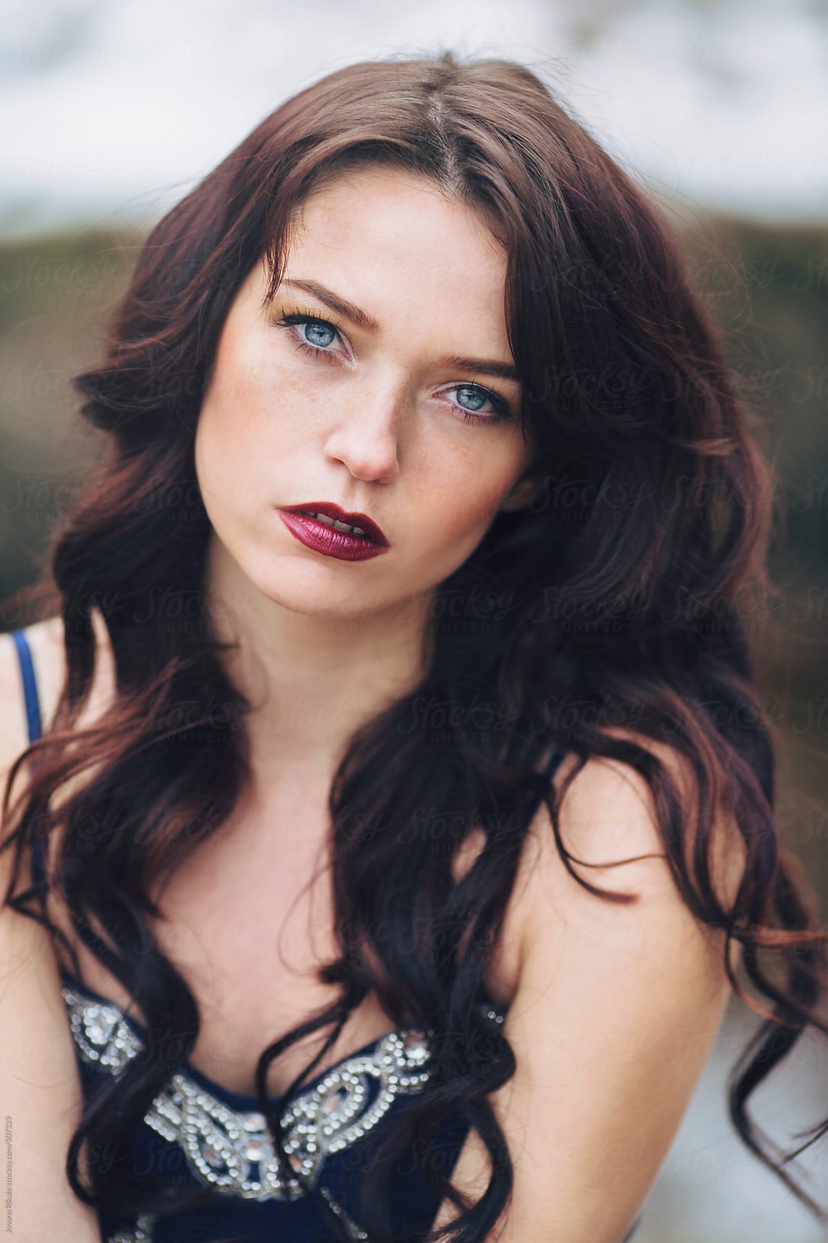 Portrait Of A Beautiful Woman With Blue Eyes And Freckles Porjovana Rikalo