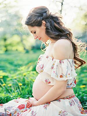 Pregnant Woman In Panties Touching Belly by Stocksy Contributor Dreamwood  Photography  - Stocksy