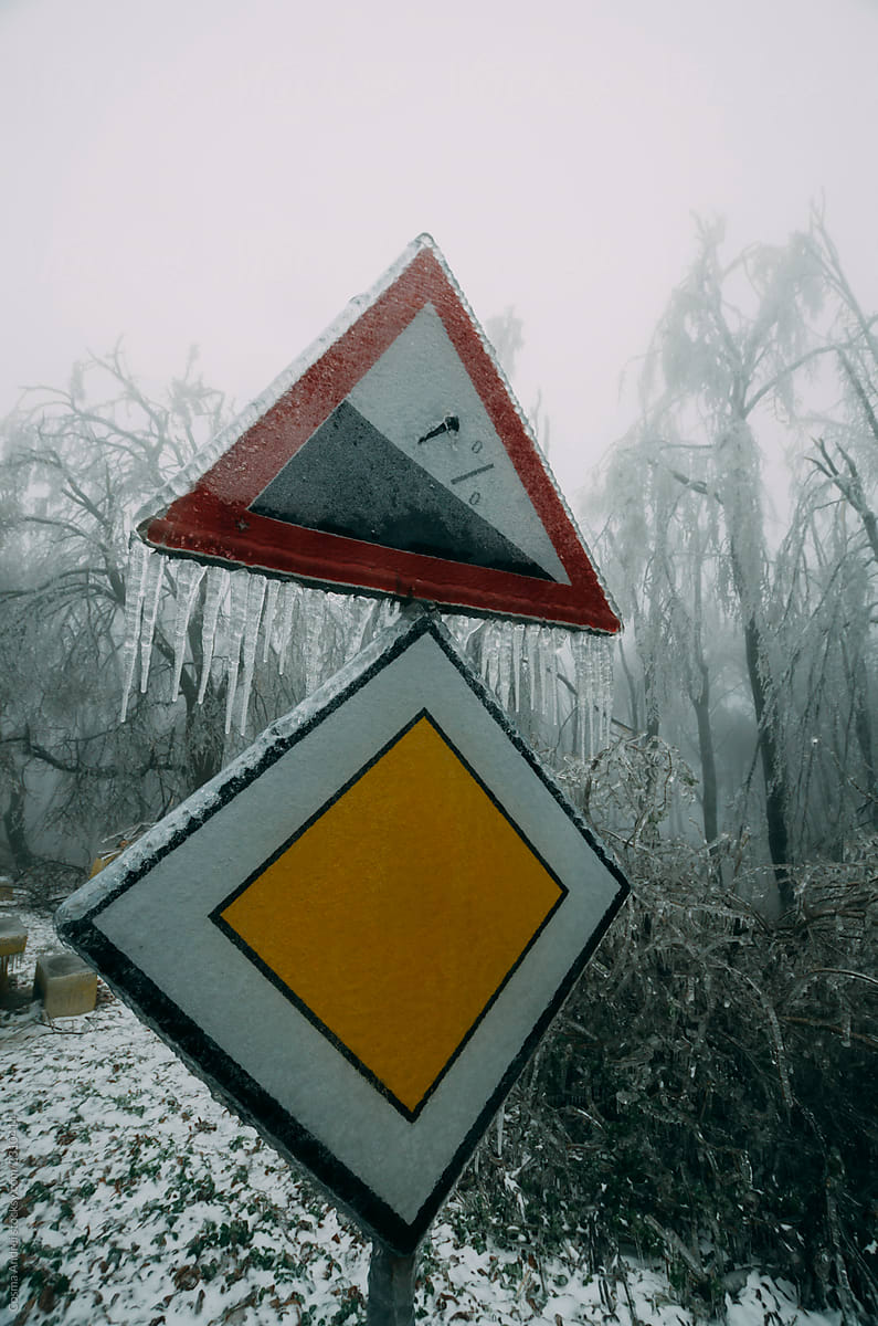Frozen road sign in winter