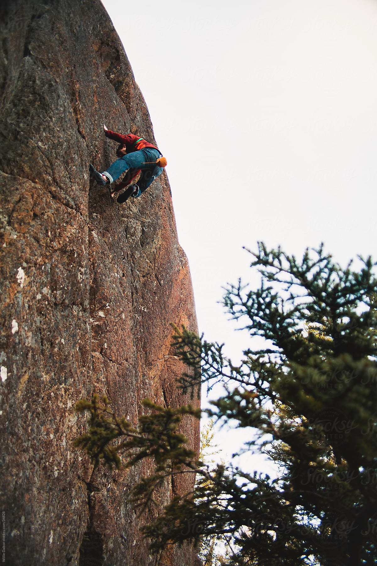 Man Climbing Cliff Without Rope