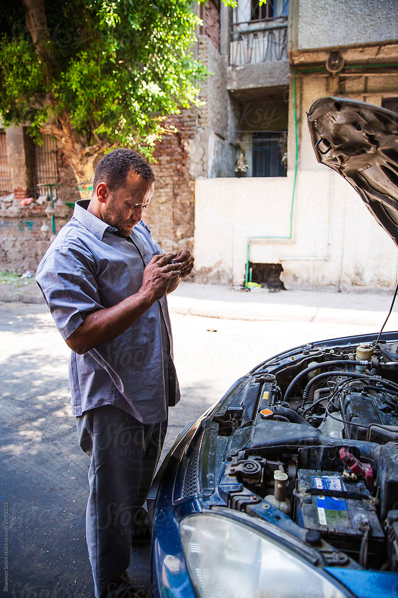 Cairo Mechanic working on car