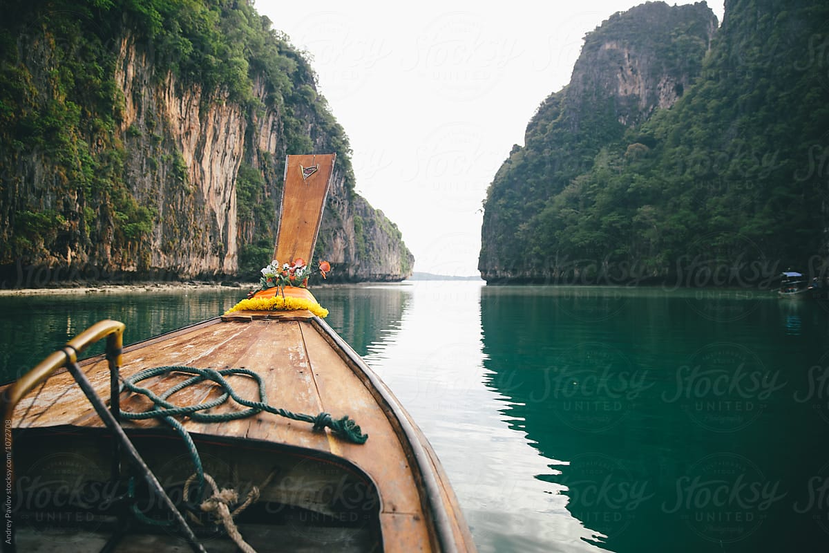 Boat floating on tranquil water surface