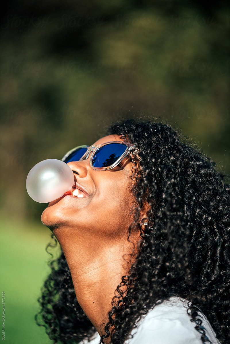black pretty girl doing bubble gum