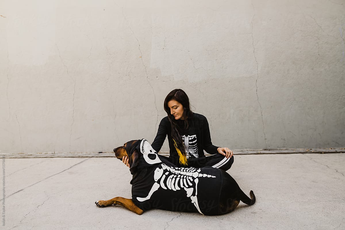 Woman and Dog in Skeleton Costumes
