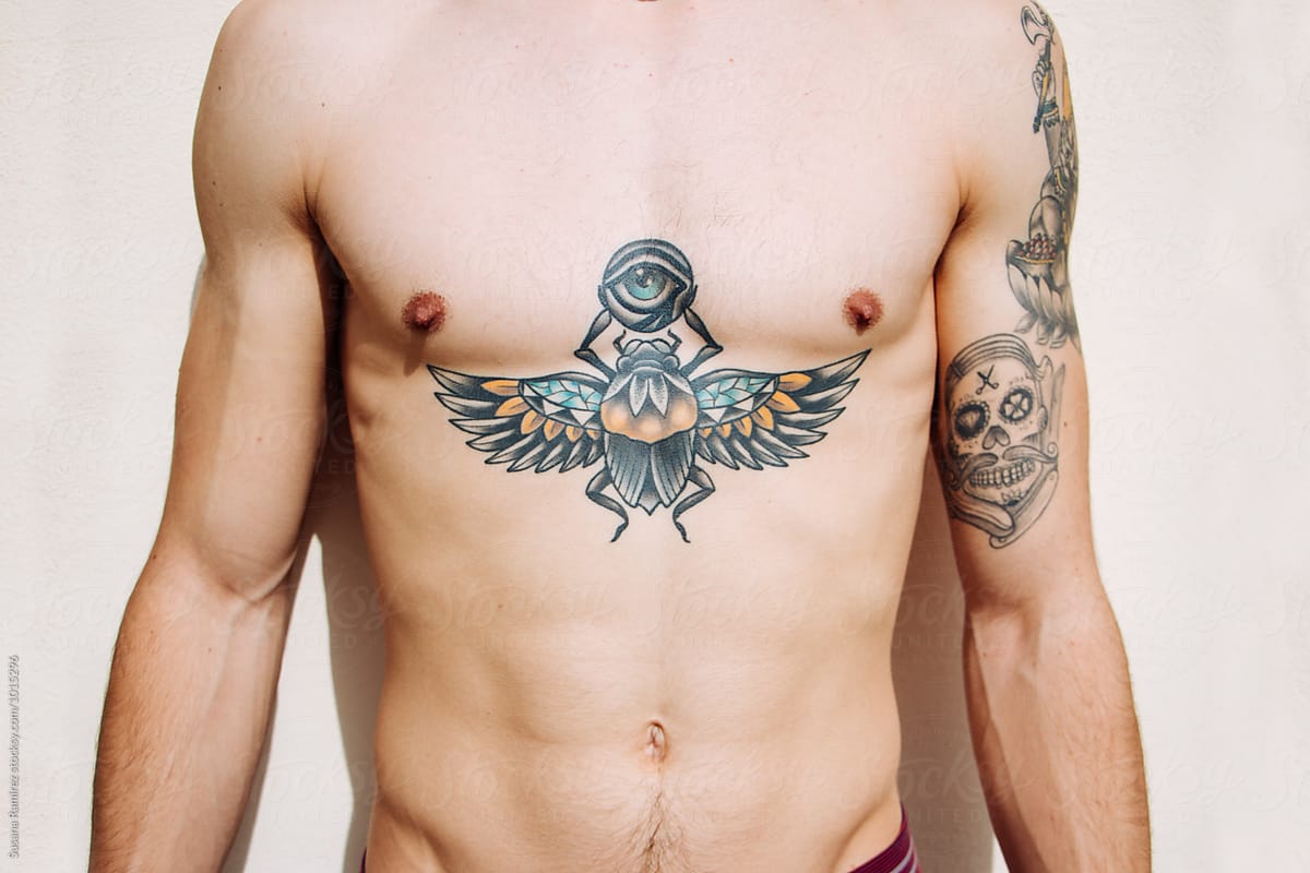 Body Of Man With Tattoo On His Chest