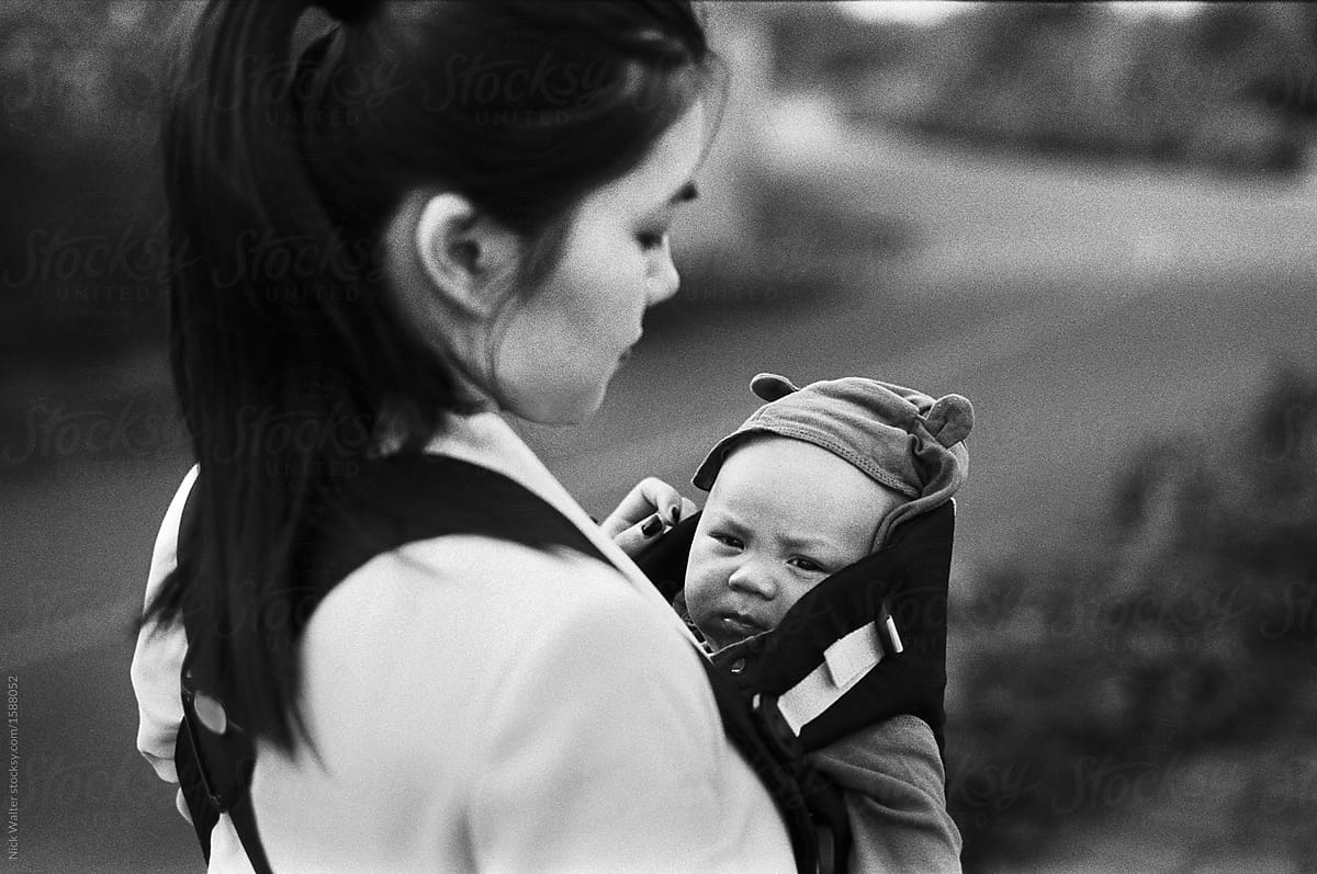 Chinese Mom With Mixed Baby in Carrier