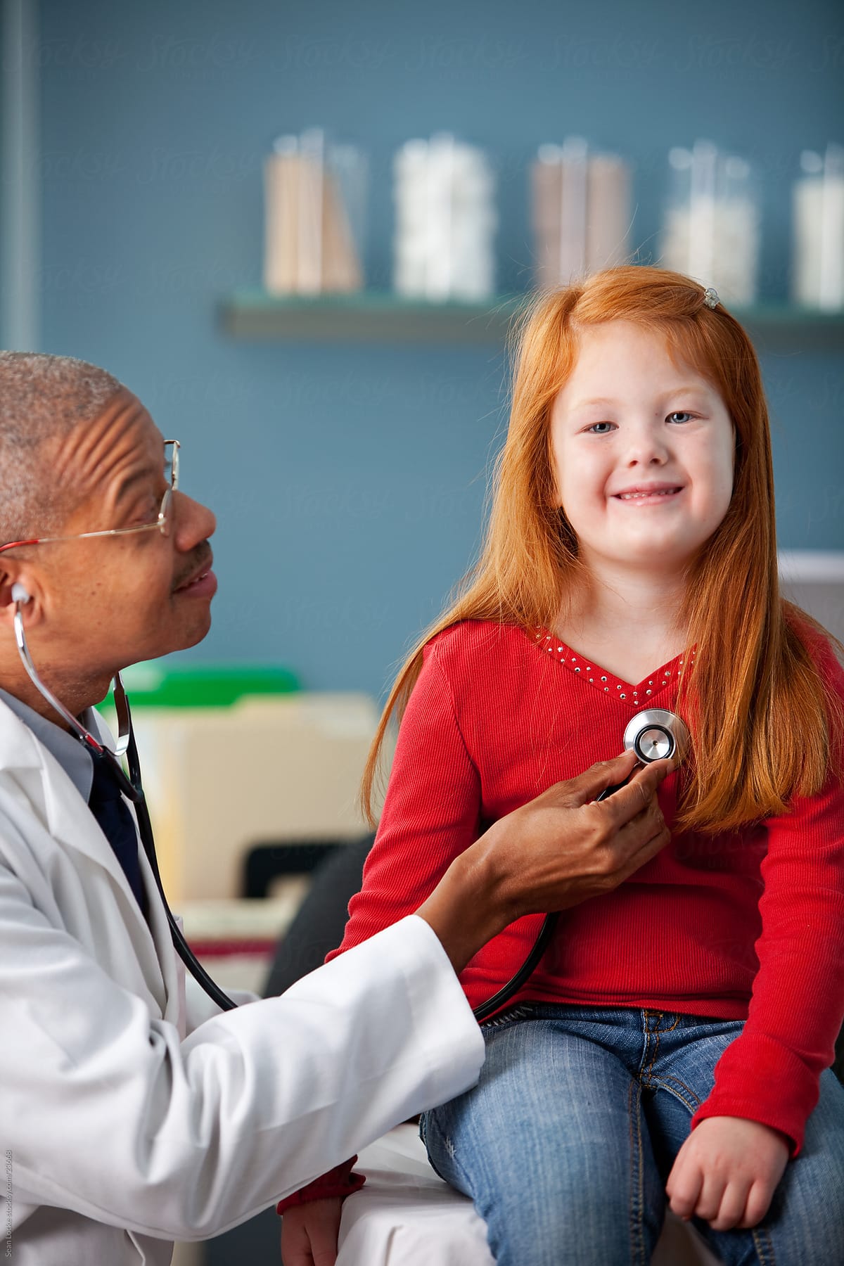 Exam Room: Girl Happy to Be Checked By Pediatrician