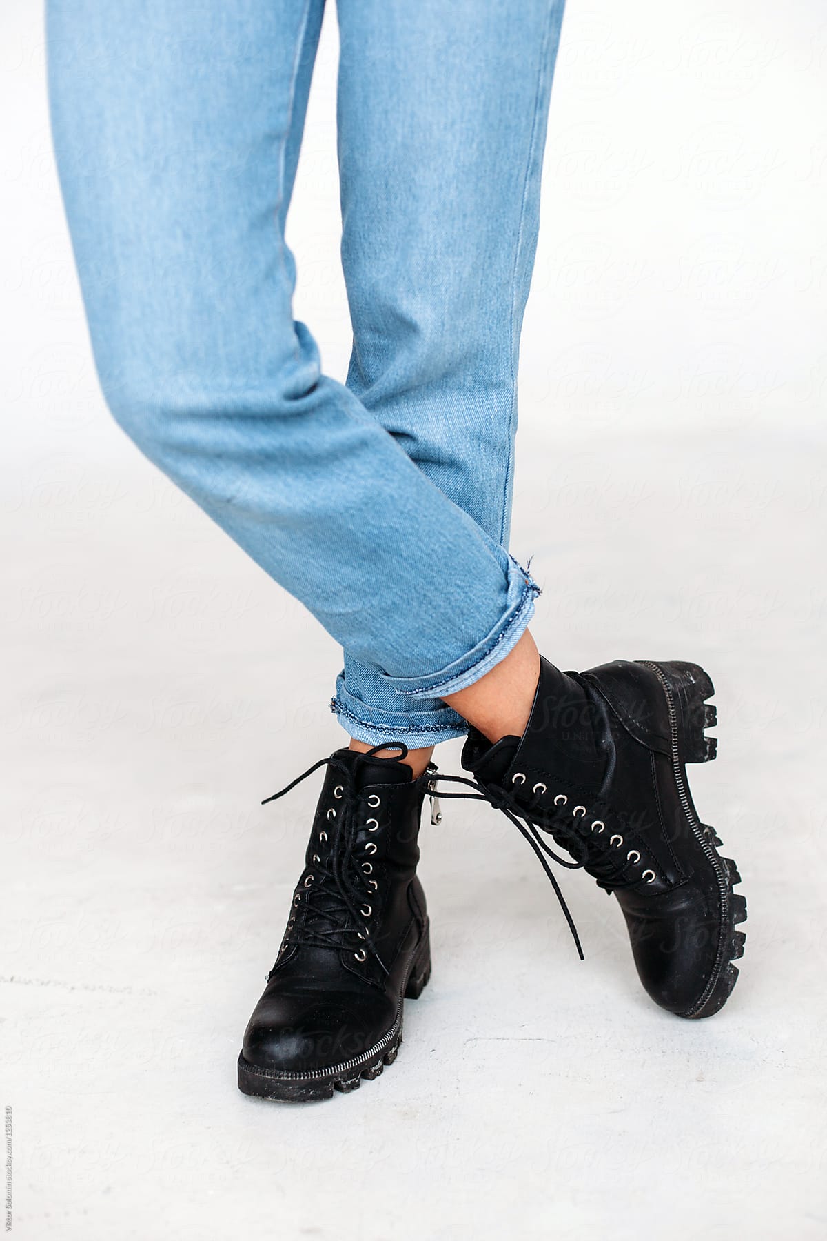 black boots light jeans