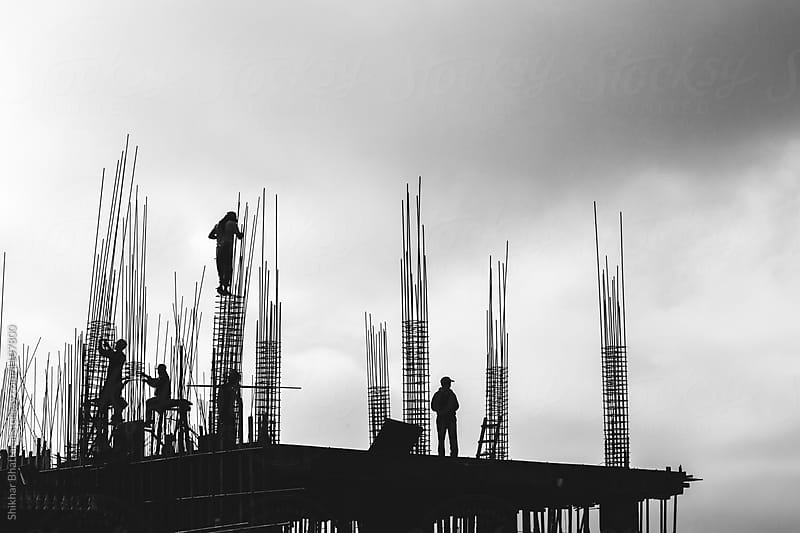 Constructions workers at a high-rise building.