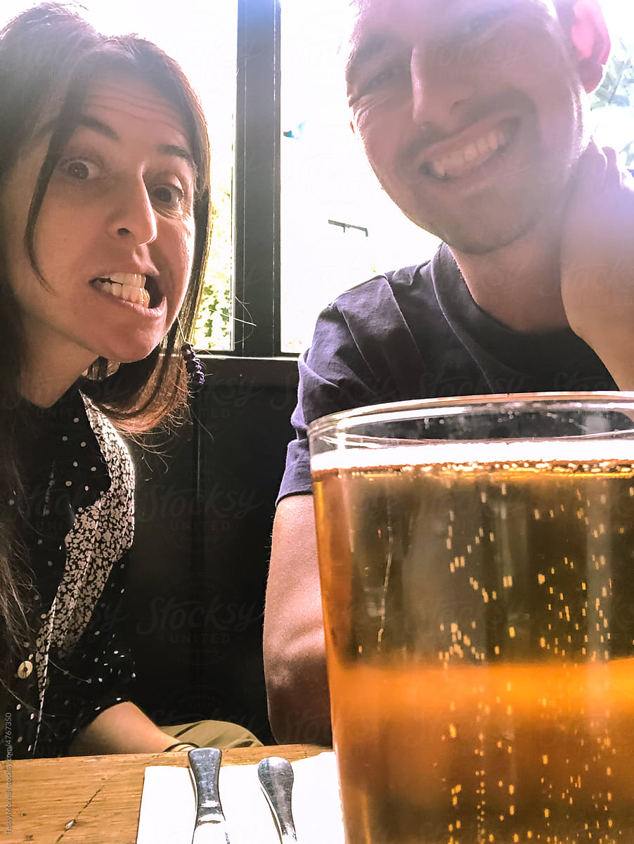 UGC couple selfie with beer in English pub