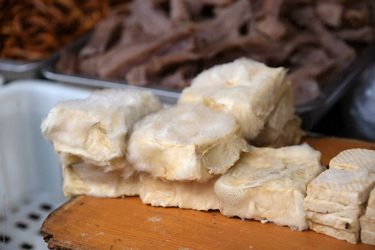 Closeup of naturally fermented moldy tofu at a farmers market
